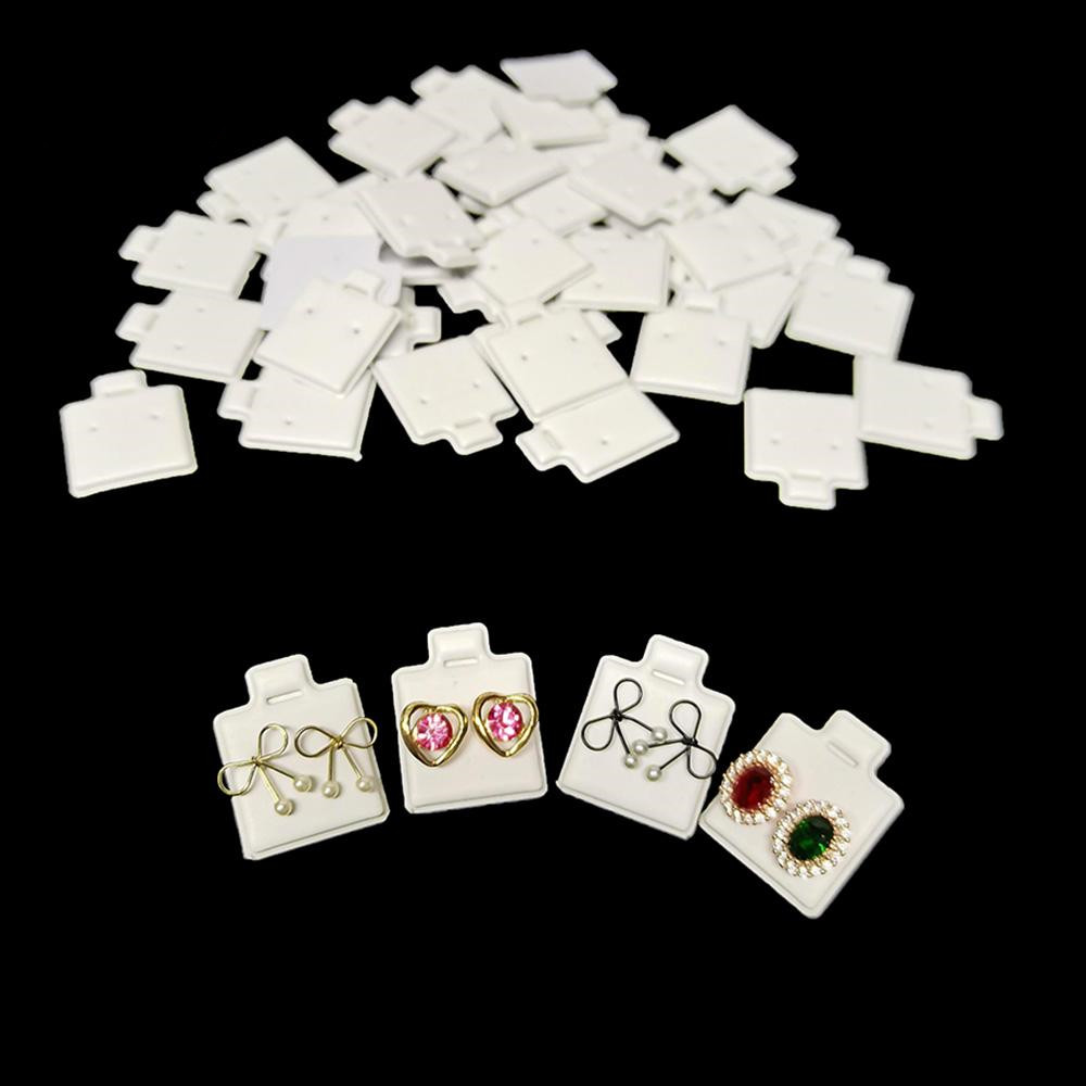 Body Jewelry Display - 100ชิ้น/ถุงผู้ถือตุ้มหูแผ่นพัฟสีขาวต่างหูการ์ดเครื่องประดับผู้ถือถาดใส่จัดระเบียบขายส่งจำนวนมาก
